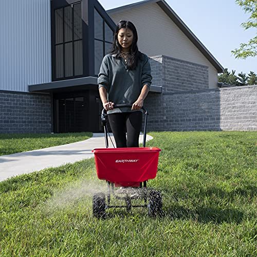 EarthWay 2030 Single 65 LB (29 KG) Capacity Commercial Walk-Behind Broadcast Spreader for Grass, Fertilizer, Seeds — Includes Side Spread Control, Even Spread, Poly Tires
